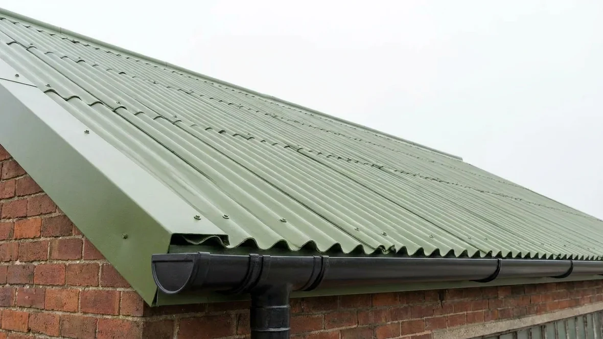 Close-up of encapsulated big six sheets and gutter line near Sheffield