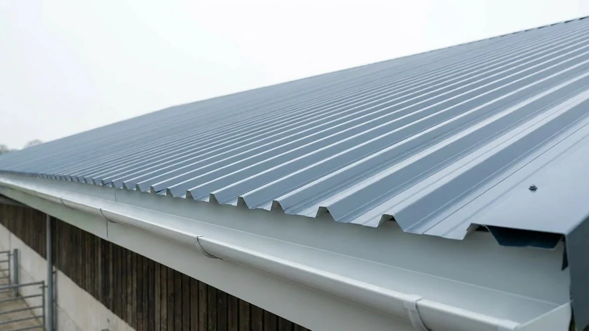 Finished eaves and lined gutter detail on a livestock building near York
