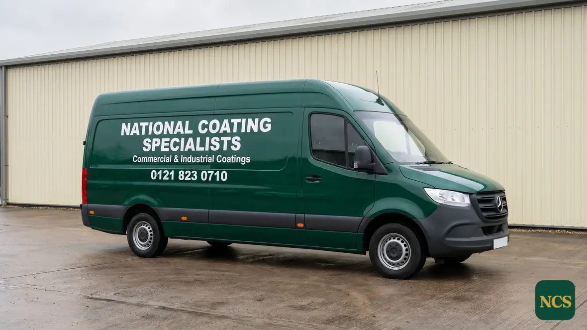 National Coating Specialists sign-written van outside a commercial building