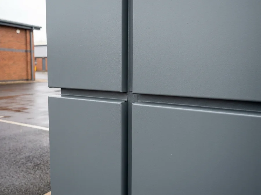 Retail park elevations brought back to a clean, uniform finish.