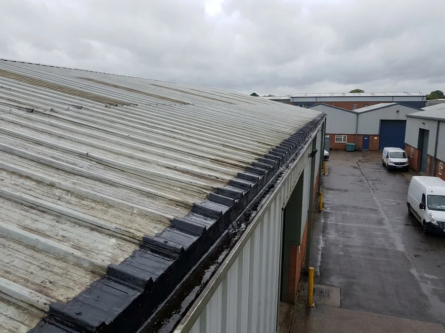 The prepared lap joint on this warehouse roof, cleaned of all corrosion and ready for primer application.