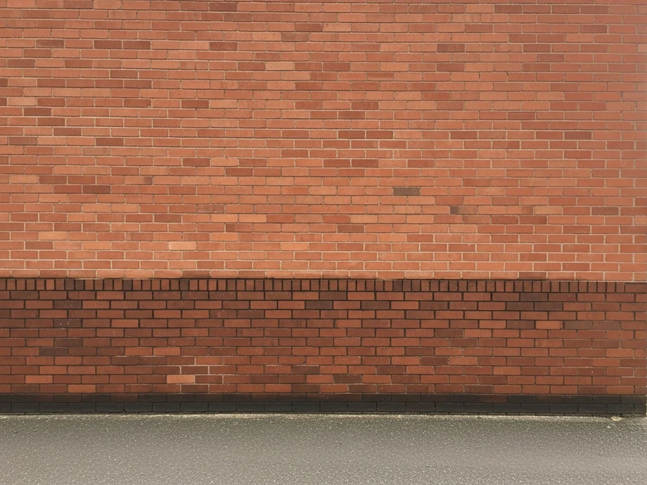 How damp-focused exterior coating is approached